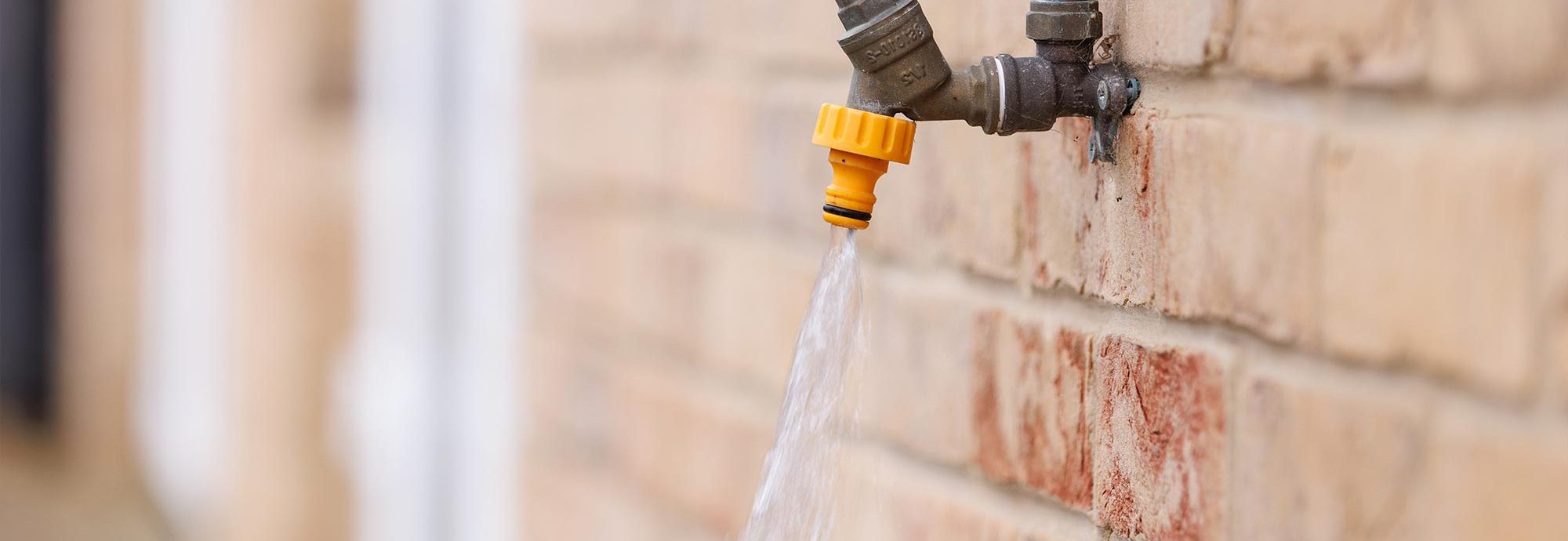 An outside tap with running water