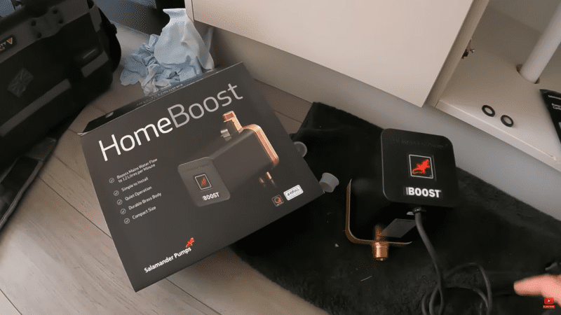 HomeBoost unpacked on the floor near the box